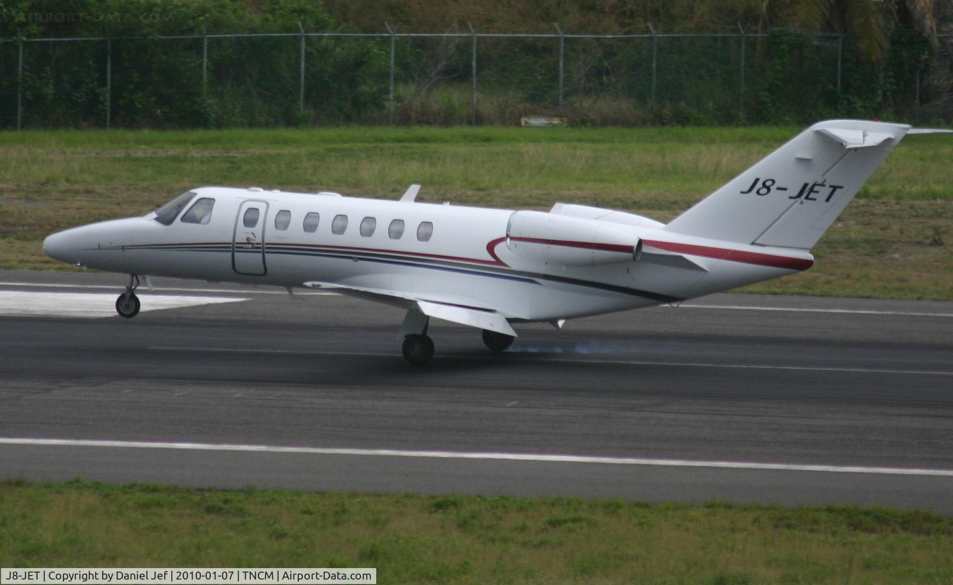 J8-JET, 2008 Cessna 525B CitationJet CJ3 C/N 525B-0247, J8-JET main landing gear down at TNCM