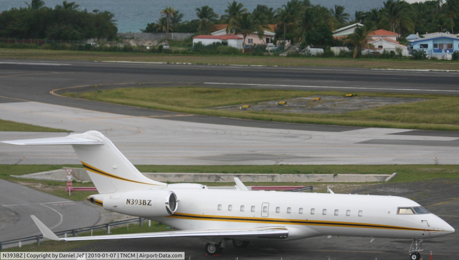 N393BZ, 1999 Bombardier BD-700-1A10 Global Express C/N 9022, N393BZ park at the cargo ramp TNCM