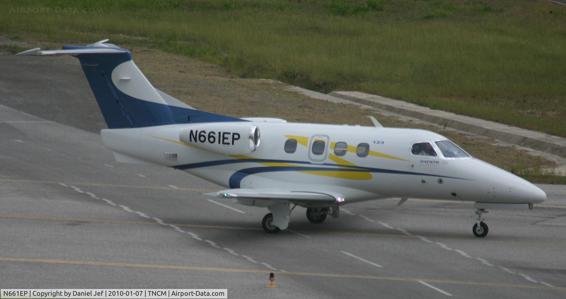 N661EP, 2010 Embraer EMB-500 Phenom 100 C/N 50000123, N661EP Taxing on the bypass to the holding point alpha for take off