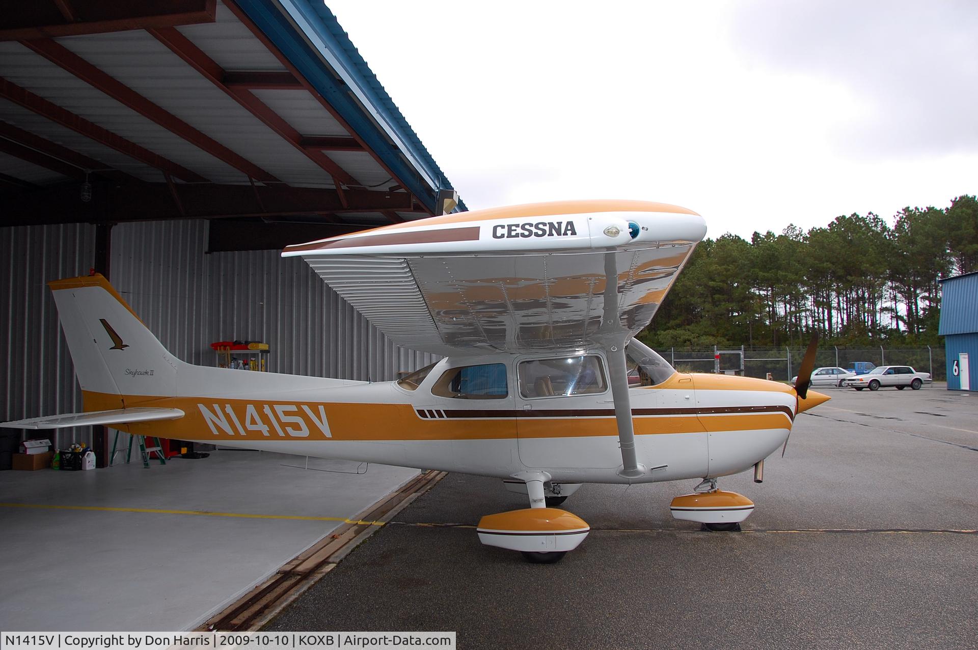 N1415V, 1974 Cessna 172M C/N 17263560, Outside of hangar, getting new wingtip strobes installed