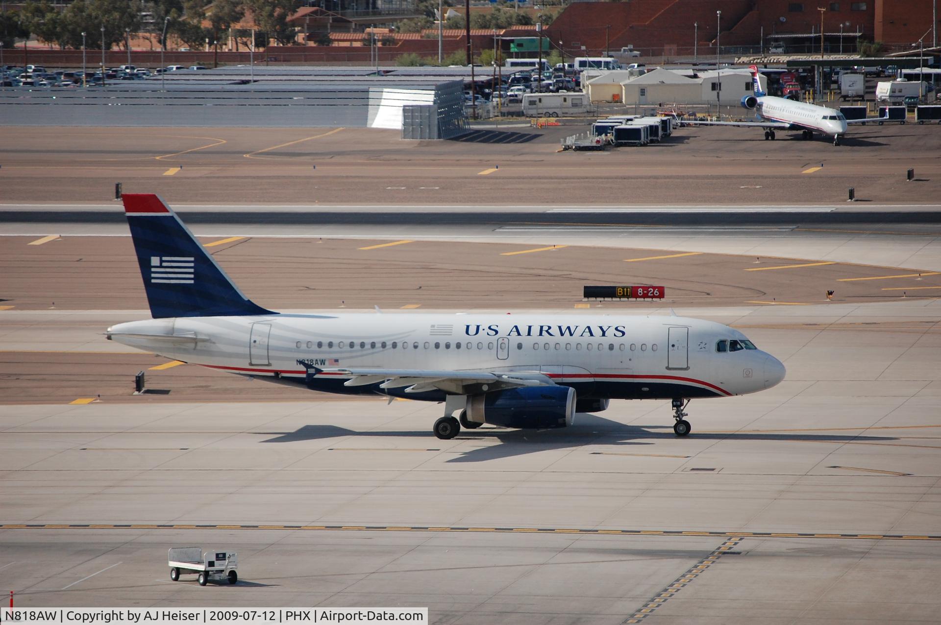 N818AW, 2000 Airbus A319-132 C/N 1375, N818AW taxiing down Charlie