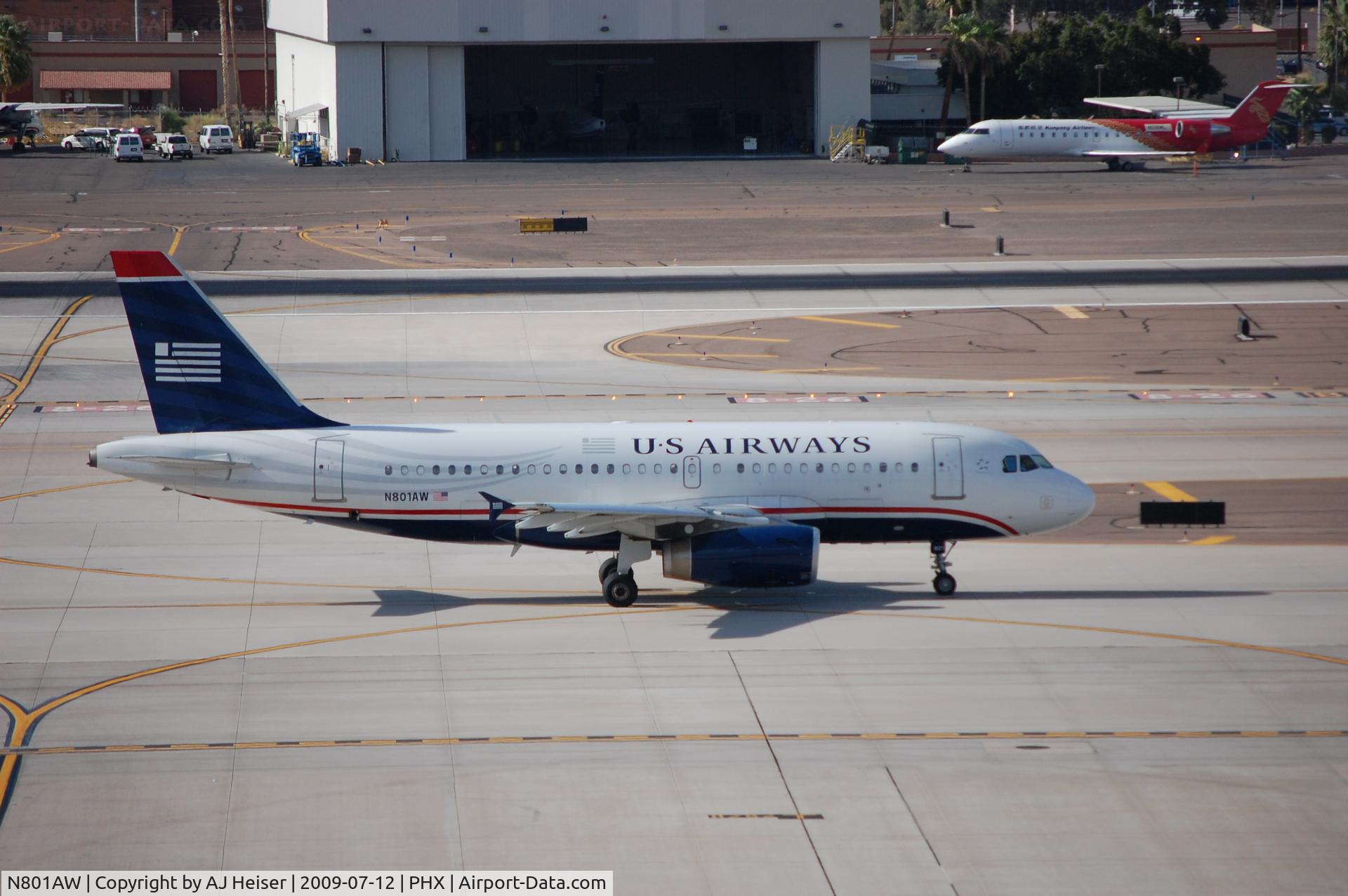 N801AW, 1998 Airbus A319-132 C/N 0889, N801AW taxiing down Charlie