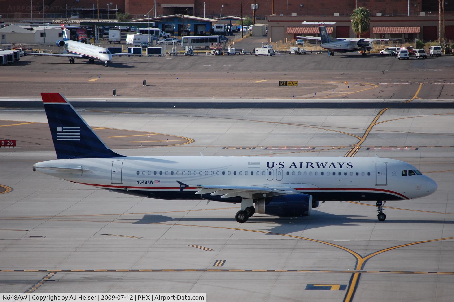 N648AW, 1997 Airbus A320-232 C/N 770, N648AW taxiing down Charlie