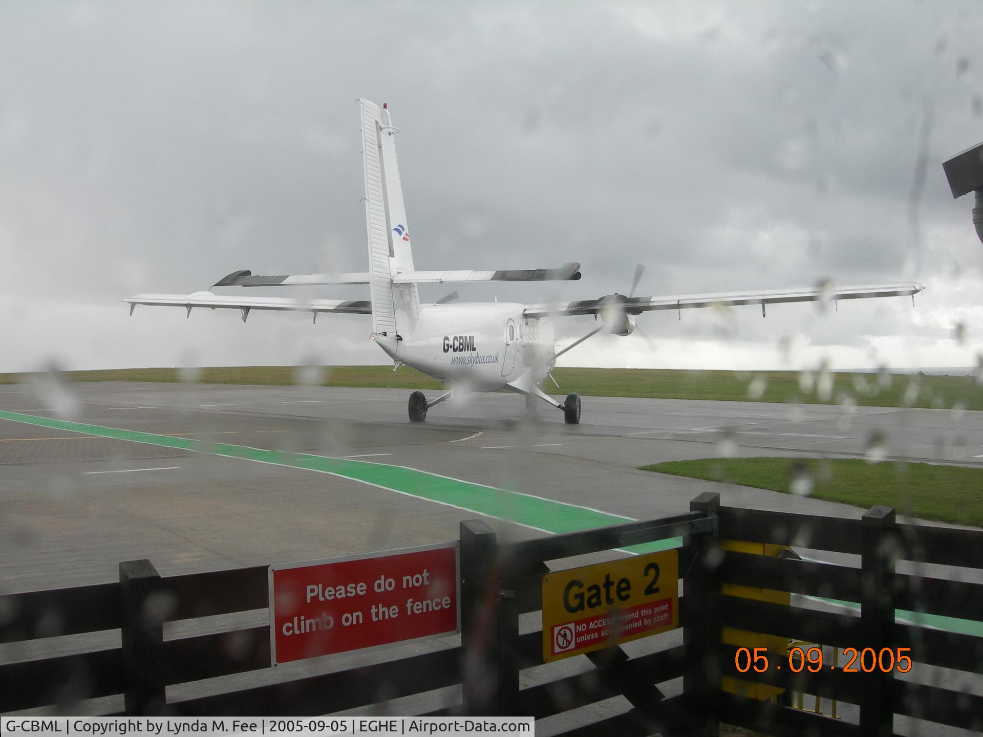 G-CBML, 1980 De Havilland Canada DHC-6-310 Twin Otter C/N 695, Waiting for Baggage Handlers