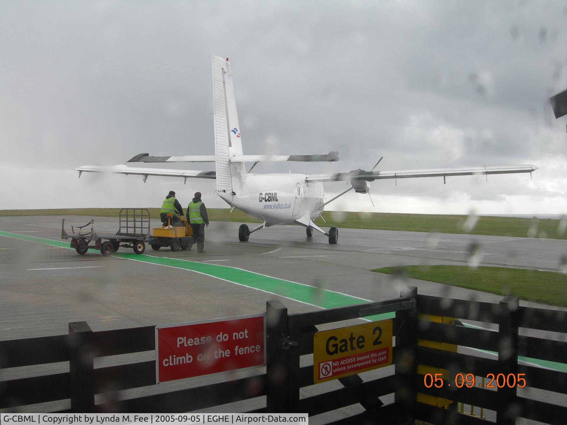 G-CBML, 1980 De Havilland Canada DHC-6-310 Twin Otter C/N 695, Baggage Handlers arriving