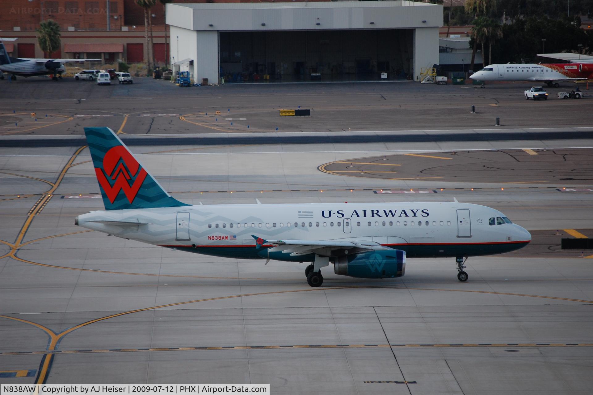N838AW, 2005 Airbus A319-132 C/N 2615, N838AW taxiing down Charlie