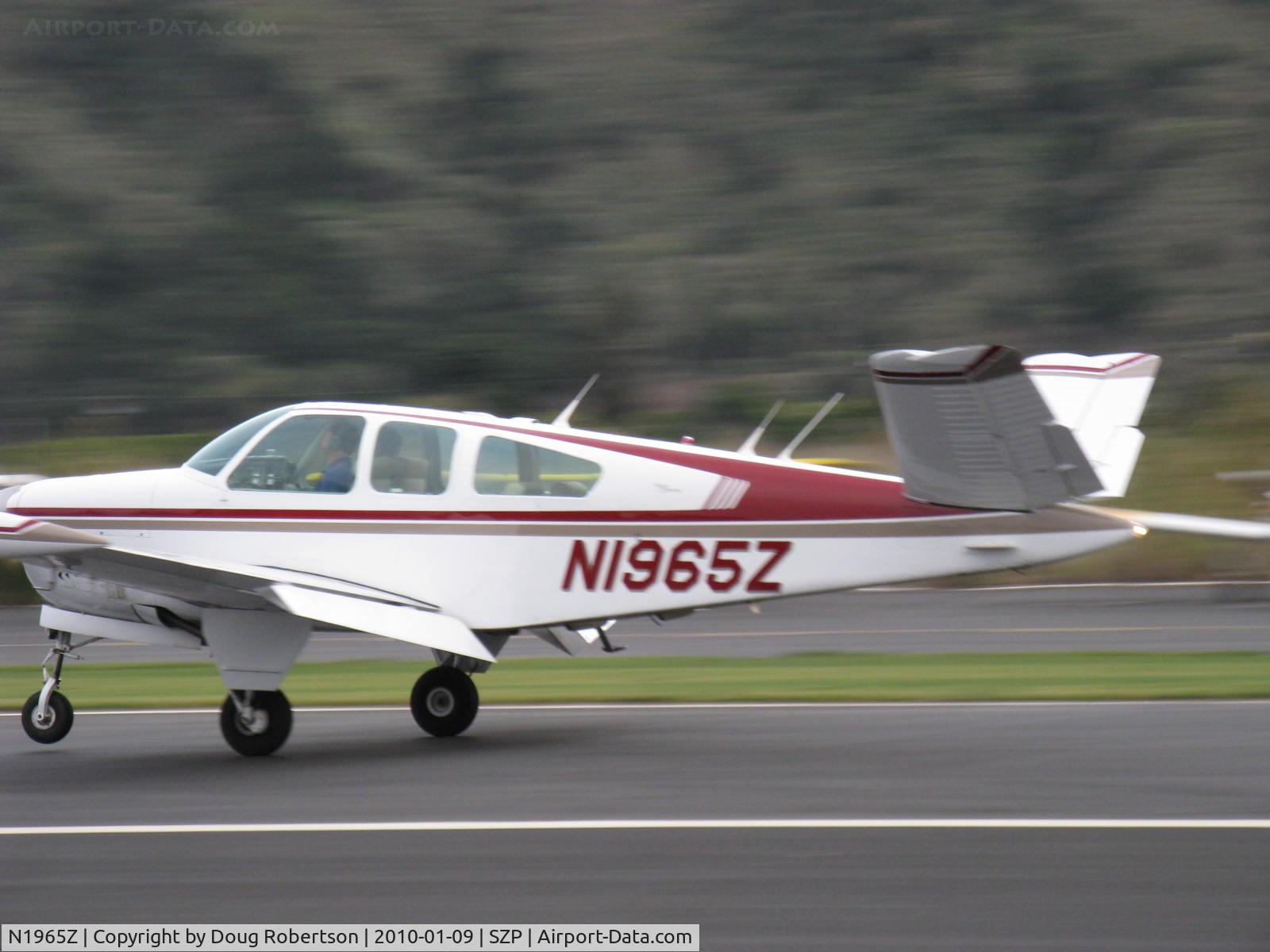 N1965Z, 1965 Beech S35 Bonanza C/N D-7805, 1965 Beech S35 BONANZA, Continental IO-520-B 285 Hp, tip tanks, landing roll Rwy 04