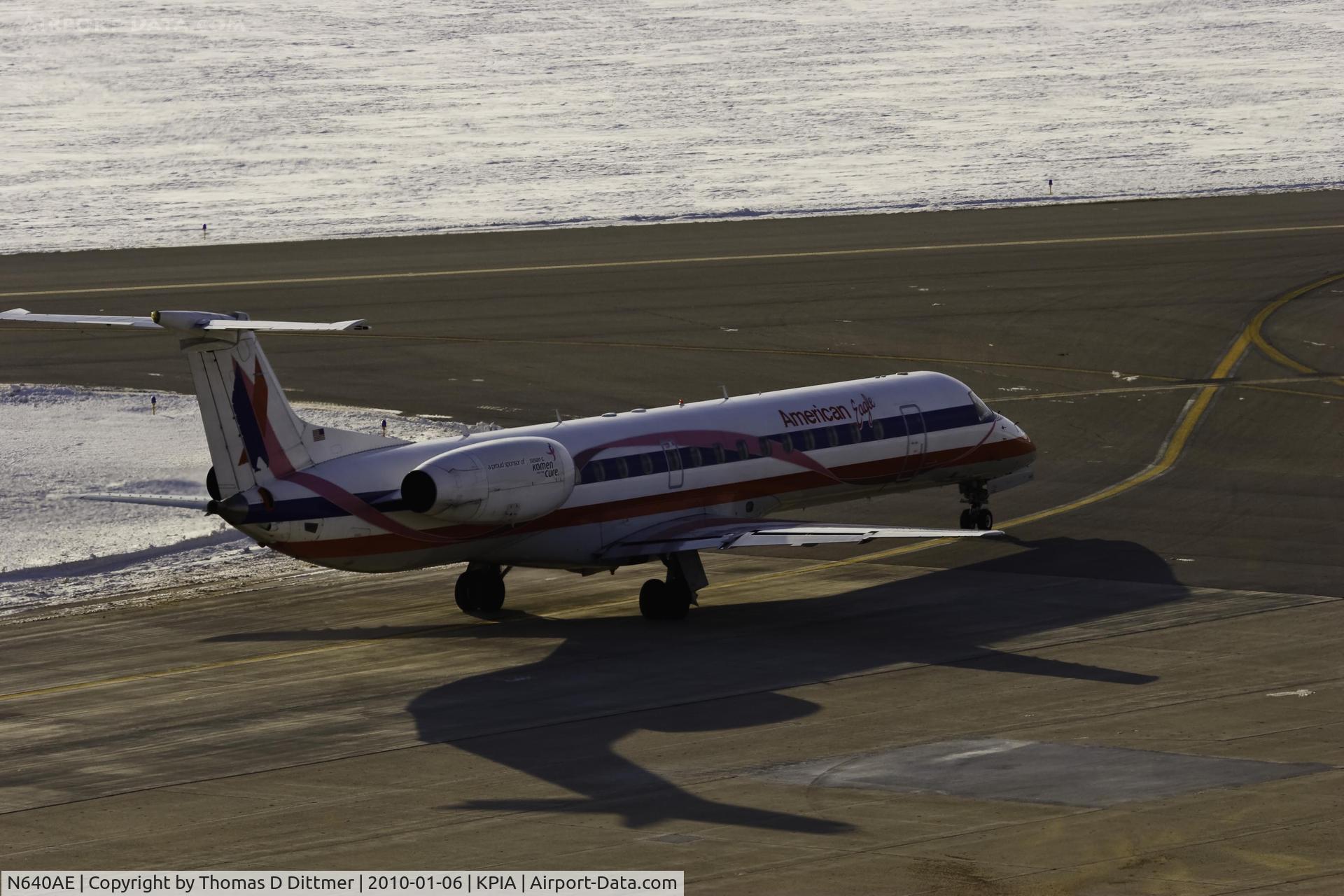 N640AE, 1999 Embraer ERJ-145LR (EMB-145LR) C/N 145183, American Eagle (N640AE) exits the commercial ramp onto taxiway Echo