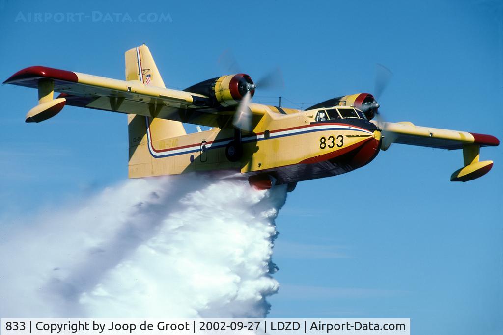 833, Canadair CL-215-I (CL-215-1A10) C/N 1012, The CL-215/CL-415 crews do regular training in water scooping and dropping off the Zadar coast in the Adriatic. Here the CL-215 drops its load of water before turning for another scooping run.