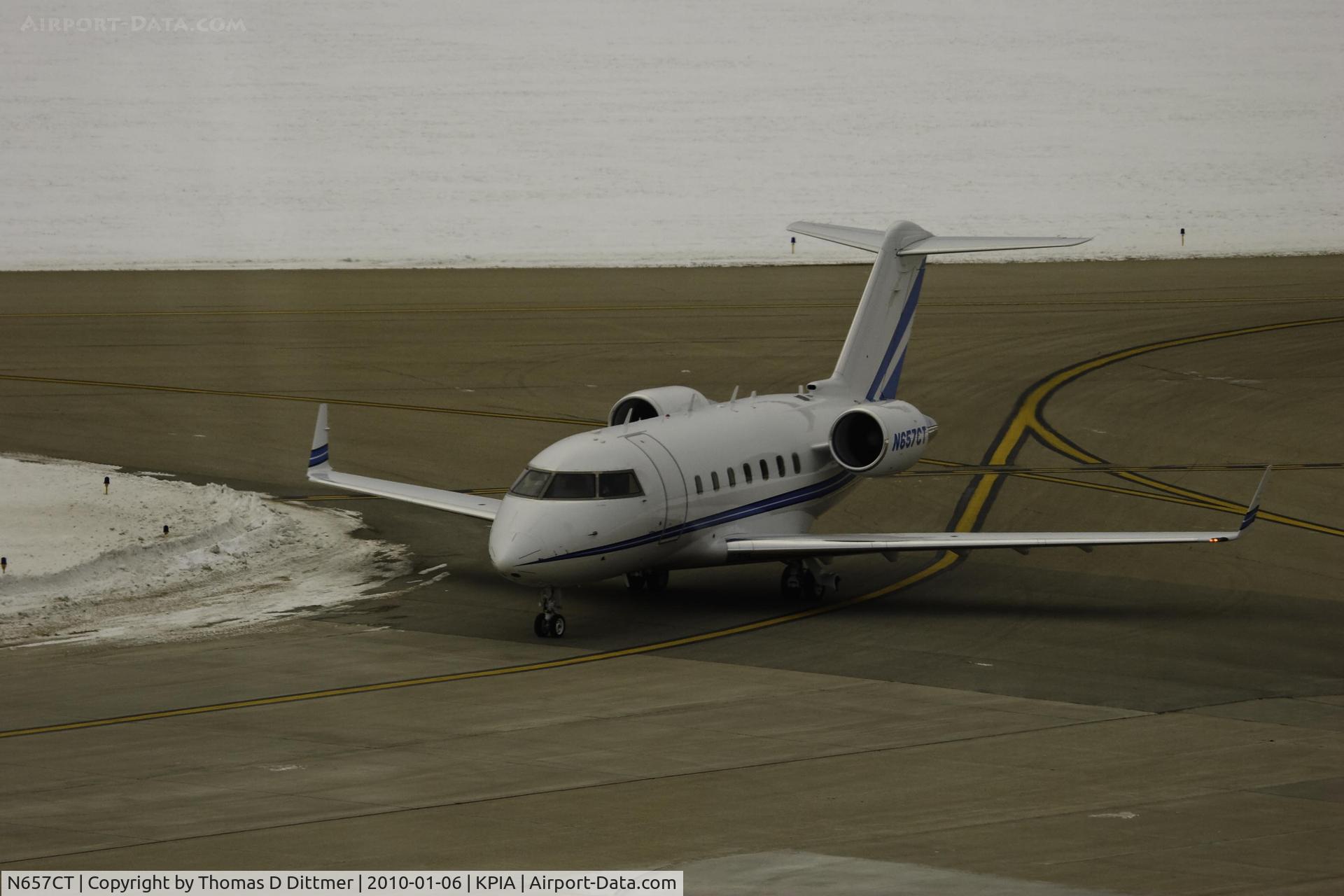 N657CT, 2006 Bombardier Challenger 604 (CL-600-2B16) C/N 5665, N657CT on taxiway Tango