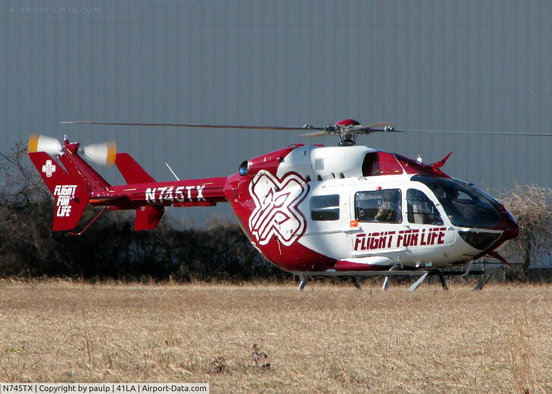 N745TX, Eurocopter-Kawasaki EC-145 (BK-117C-2) C/N 9295, About to lift off from Downtown Shreveport.