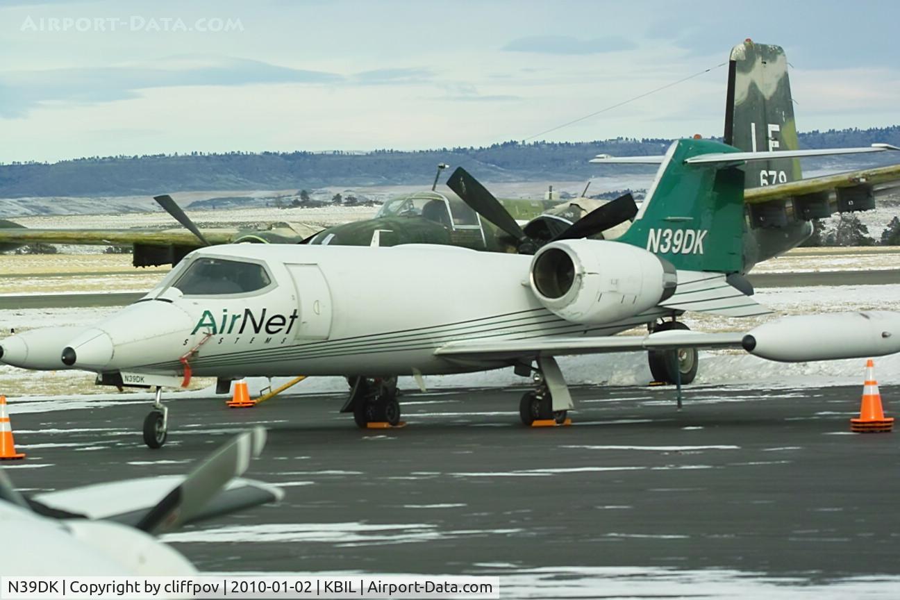 N39DK, 1982 Gates Learjet 35A C/N 480, Lear 35  in front of B-26