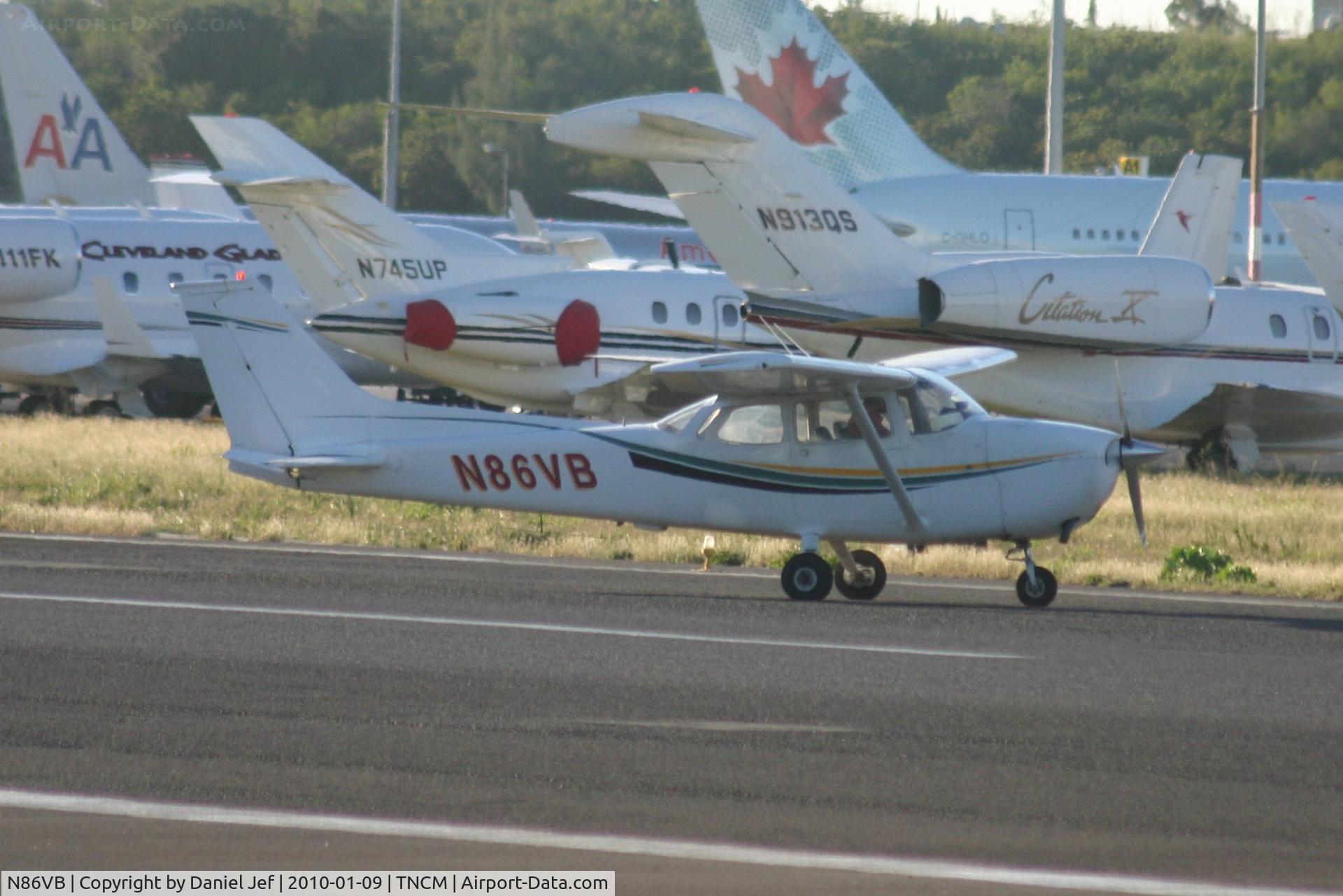 N86VB, 1974 Cessna 172M C/N 17263670, N86VB just landed at TNCM and taxing to parking