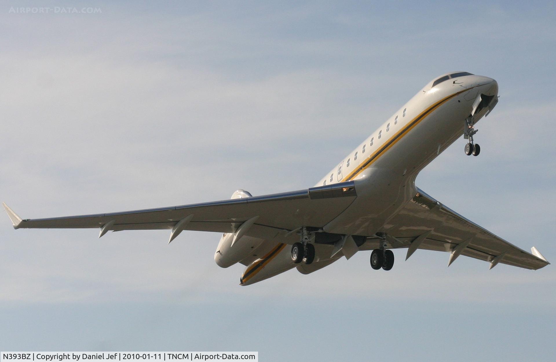 N393BZ, 1999 Bombardier BD-700-1A10 Global Express C/N 9022, N393BZ on departure from TNCM