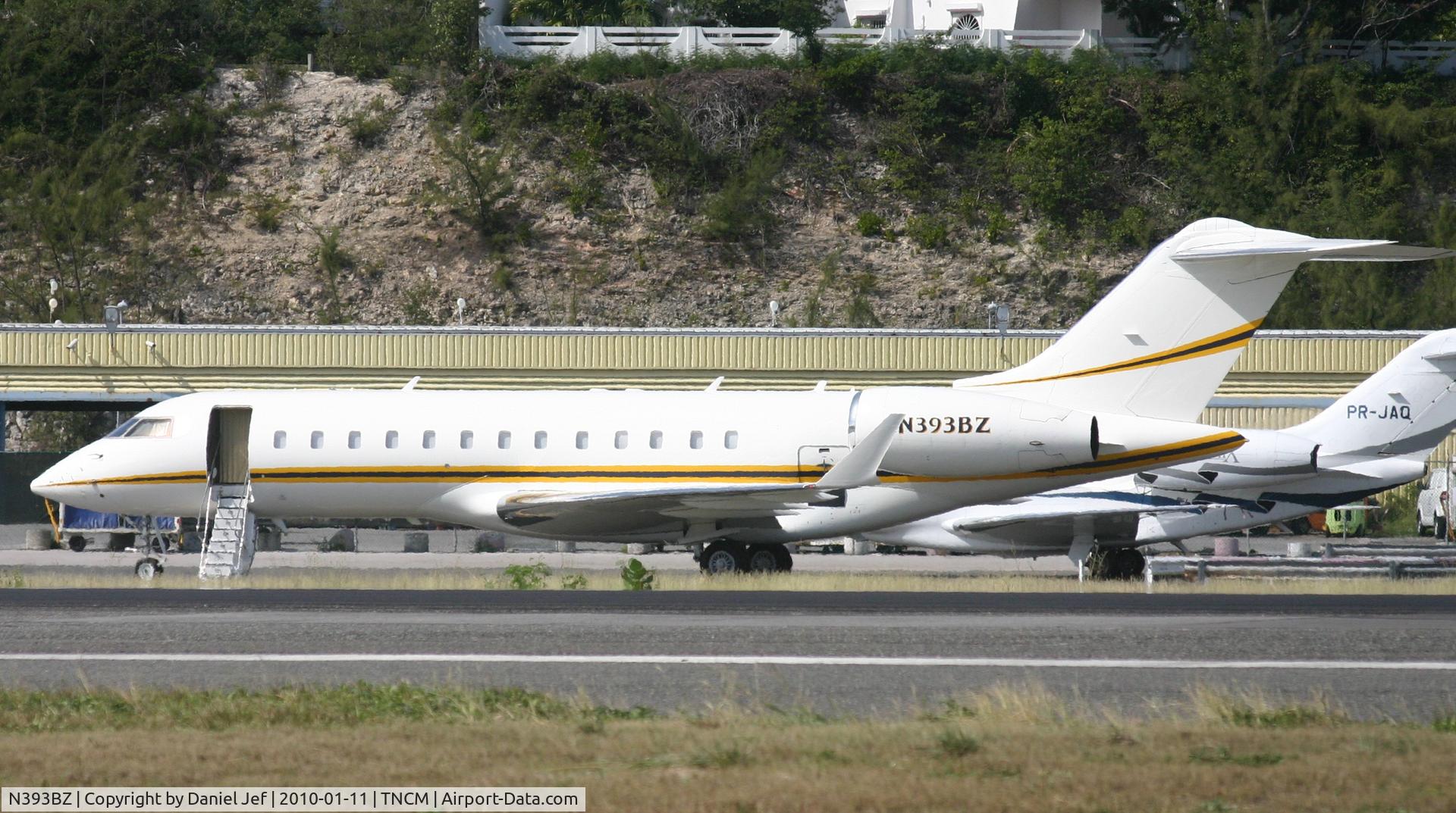 N393BZ, 1999 Bombardier BD-700-1A10 Global Express C/N 9022, N393BZ park at the cargo ramp at TNCM befor take off