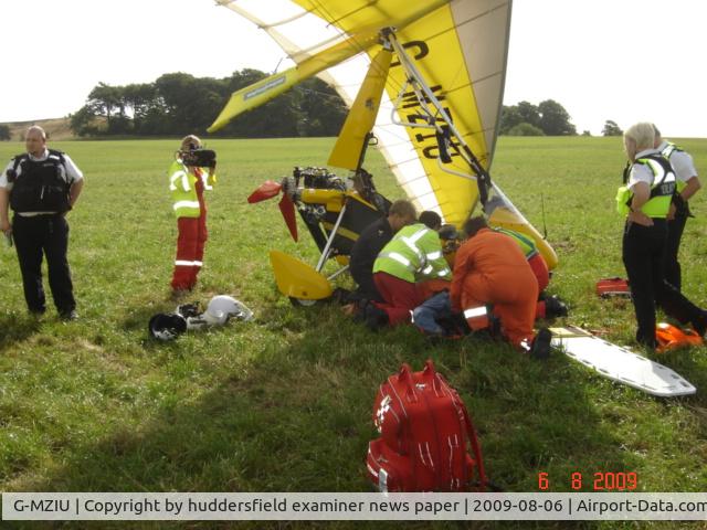 G-MZIU, 1997 Pegasus Quantum 15 C/N 7371, following mid-air colision over huddersfield,yorkshire.cessna 152 flew into rear of g-mziu 1,800ft agl.pilot and passenger of g-mziu survived,pilot landed flexwing on 30 degree hilside without further damage to g-mziu, incident filmed by BBC  helecoptor h