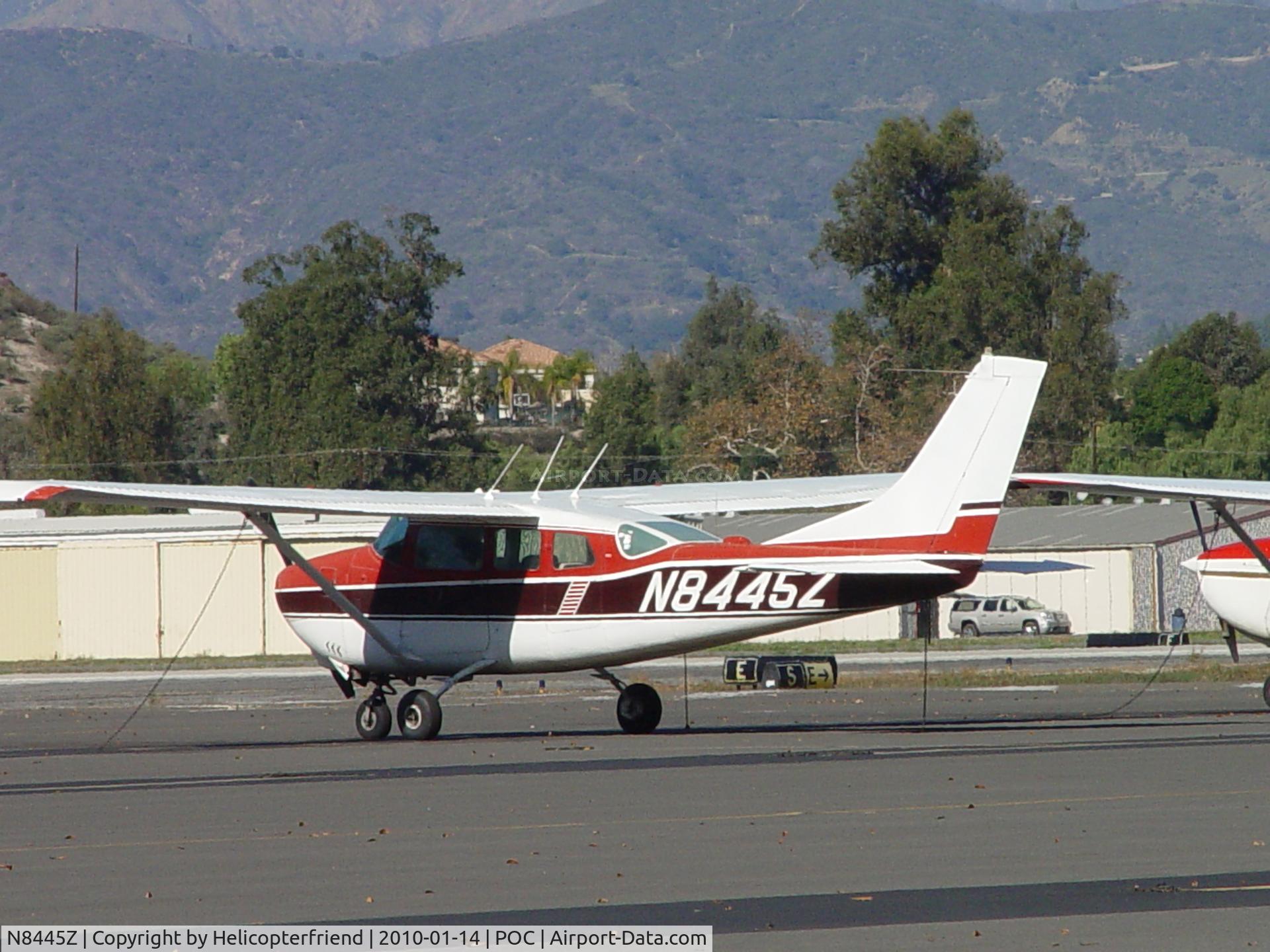 N8445Z, 1963 Cessna 210-5(205) C/N 205-0445, Tied down and parked in transient parking
