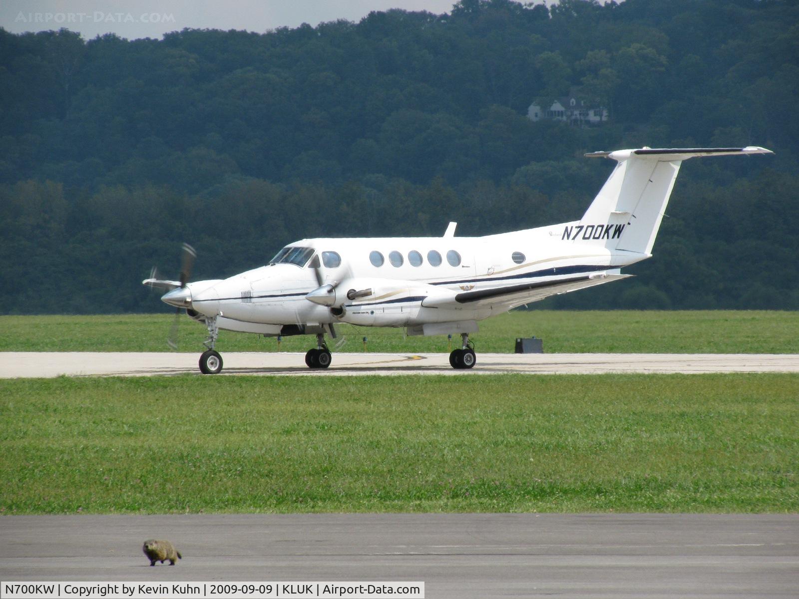 N700KW, 1976 Beech 200 Super King Air C/N BB-115, I had seen (and photographed) this Groundhog running around the tarmac that day, but I didn't notice he'd snuck into this shot until I was sorting things a few months later. A personal favorite of mine.