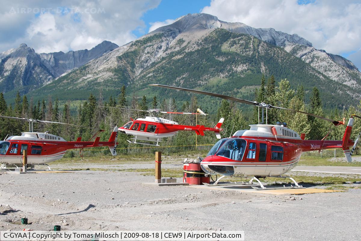 C-GYAA, Bell 407 C/N 53152, C-GYAA between C-GALL and C-GALJ at Alpine Helicopter's Homebase in Canmore