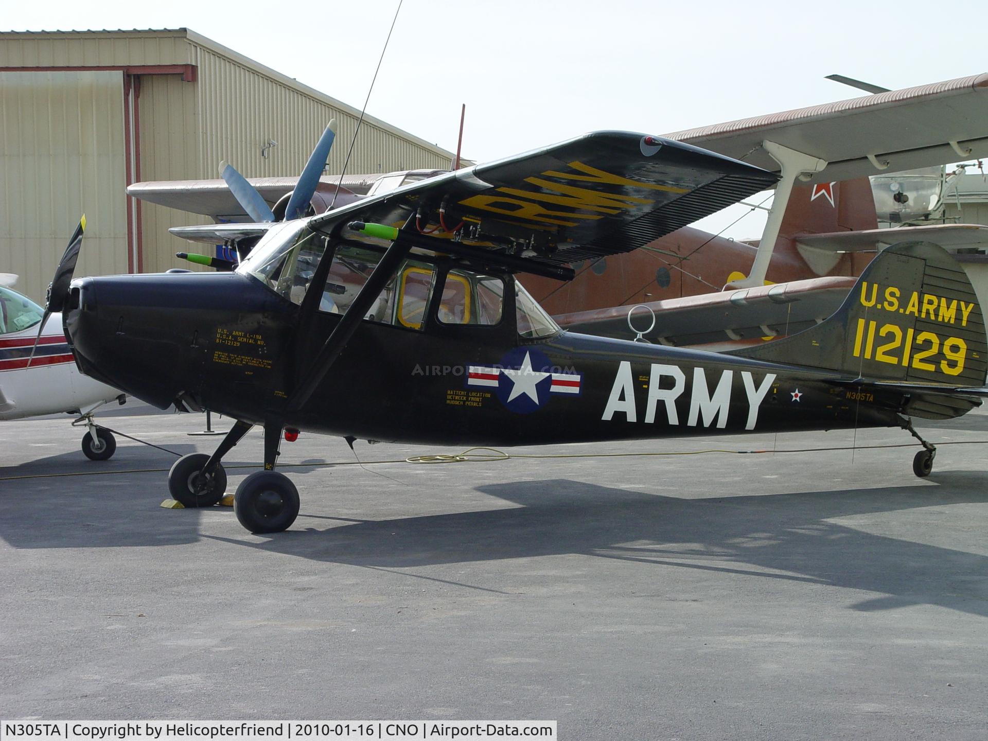 N305TA, 1951 Cessna 305A C/N 22443, Parked outside Plane of Fame hangar