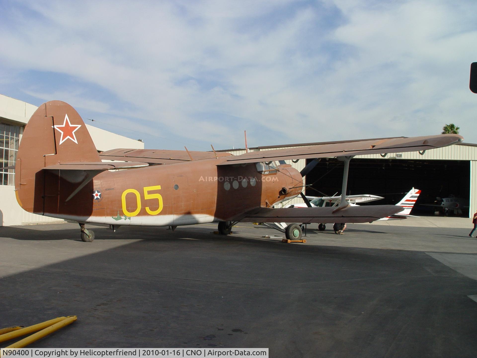 N90400, 1962 Antonov An-2 C/N 1 G 2722, Parked across from Plane of Fame hangar