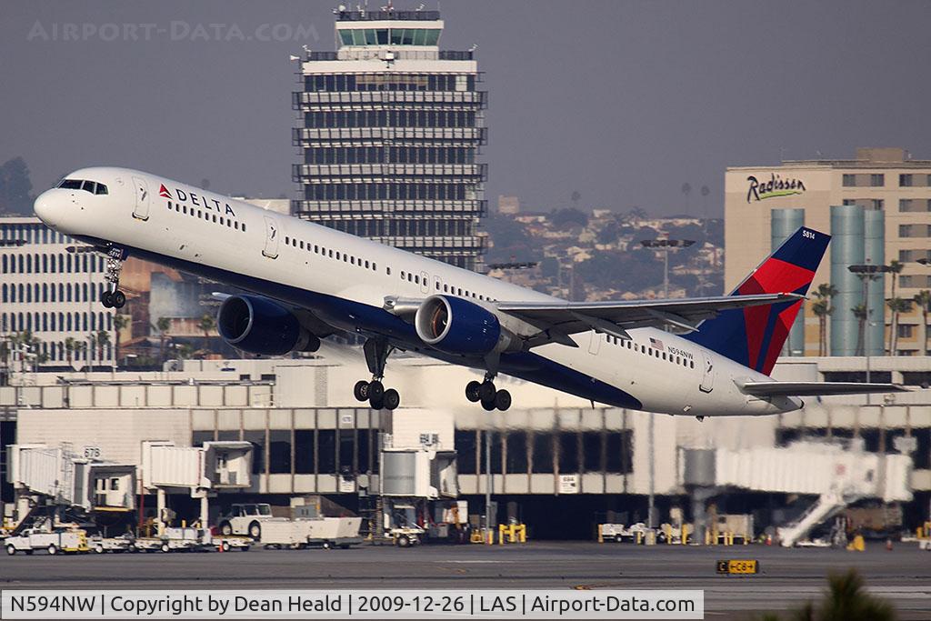 N594NW, 2003 Boeing 757-351 C/N 32994, Delta Air Lines N594NW (FLT NWA2123) departing RWY 25R enroute to Honolulu Int'l (PHNL).