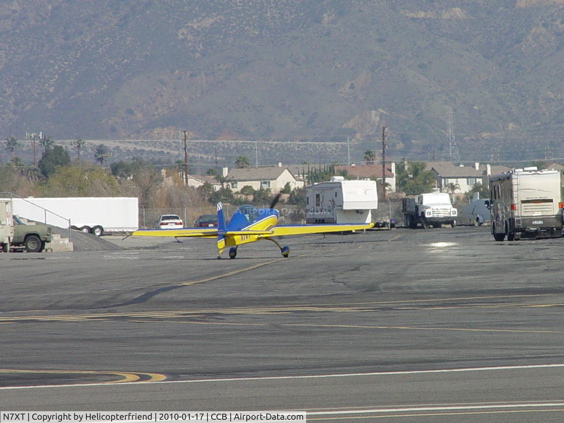 N7XT, 2003 Extra EA-300/L C/N 167, Taxiing to hangar after landing