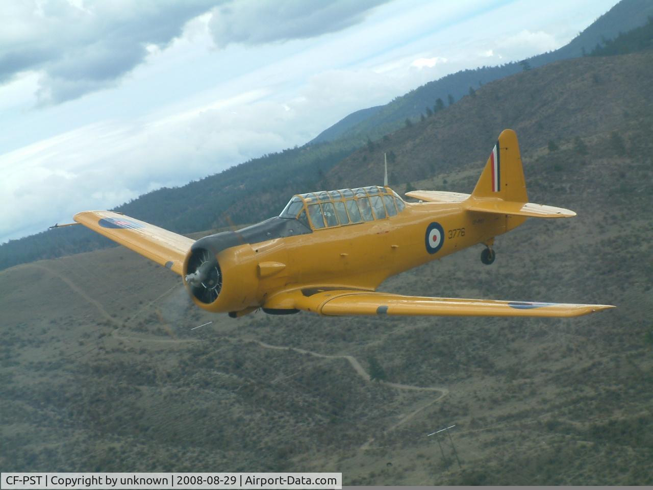 CF-PST, 1943 North American Harvard II C/N 81-4043, air-to-air