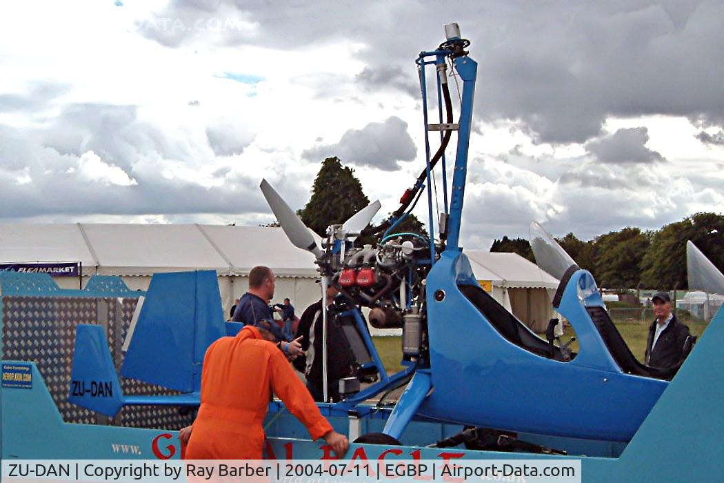ZU-DAN, Magni Gyro M-16 Tandem Trainer C/N 16-02-2124, Magni VPM M-16 Tandem Trainer [16-02-2124] Kemble~G 11/07/2004. Seen at the PFA Fly in 2004 Kemble UK. This is currently based in the UK t Dishforth York.