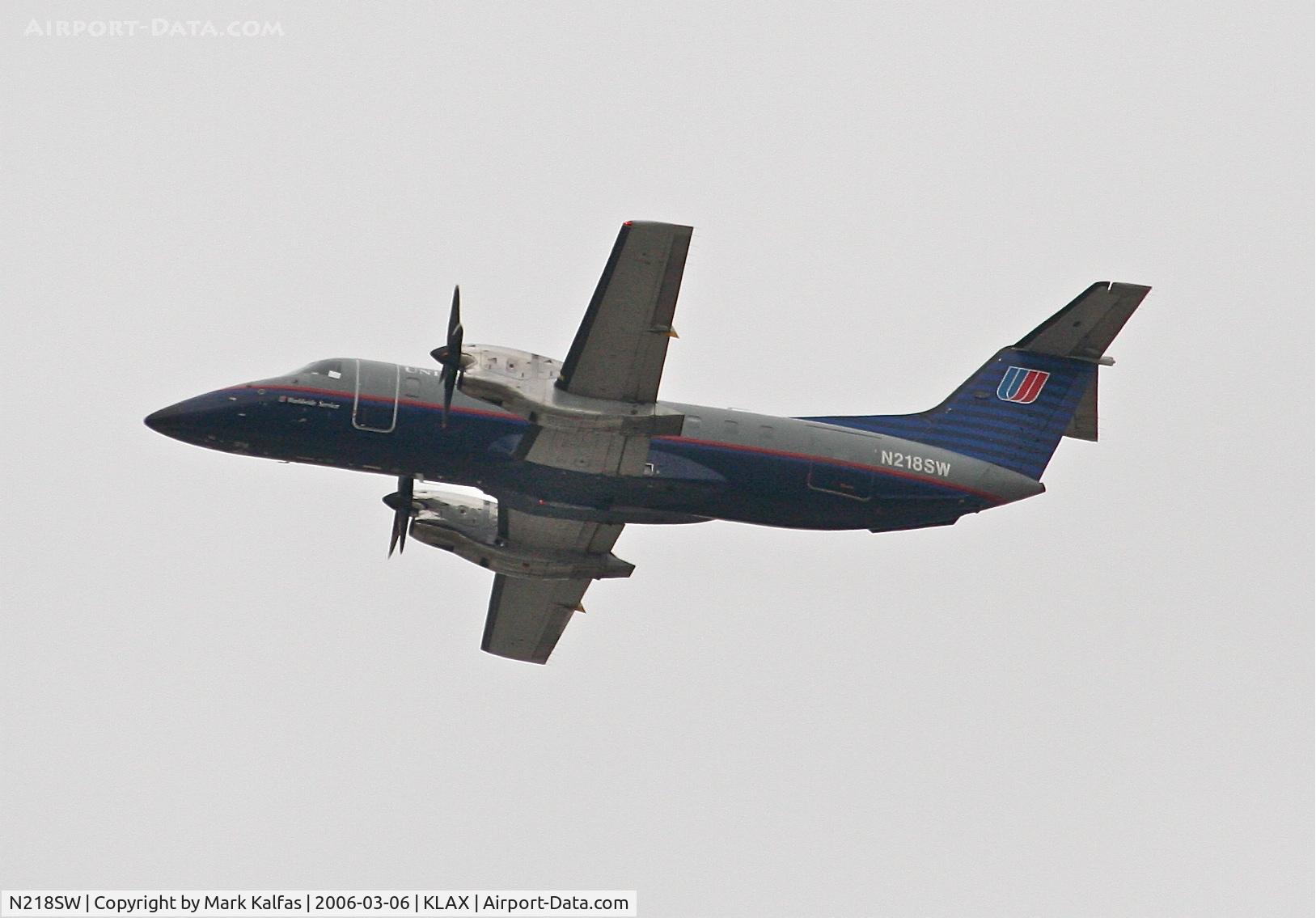N218SW, 1994 Embraer EMB-120ER Brasilia C/N 120.287, SkyWest EMB-120ER, 25R departure KLAX.