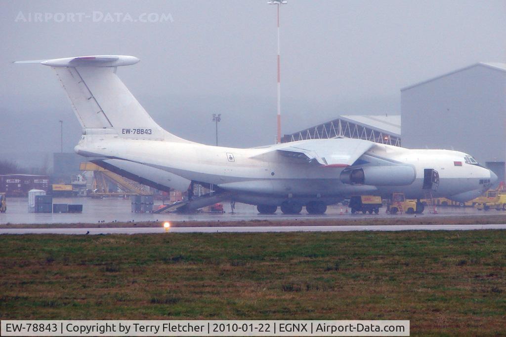 EW-78843, 1990 Ilyushin Il-76TD C/N 1003403082, A rather murky image of Trans Avia Export Cargo's IL-76 being loaded in pouring rain at EMA with supplies for the Haiti Relief effort