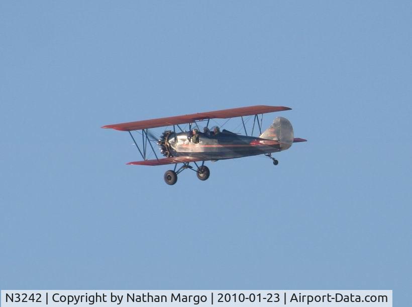 N3242, 1927 Curtiss-Wright Travel Air 4000 C/N 256, Seen Flying over La Jolla Cove, San Diego, CA