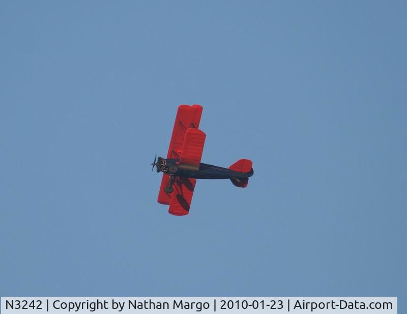 N3242, 1927 Curtiss-Wright Travel Air 4000 C/N 256, Seen Flying over La Jolla Cove, San Diego, CA