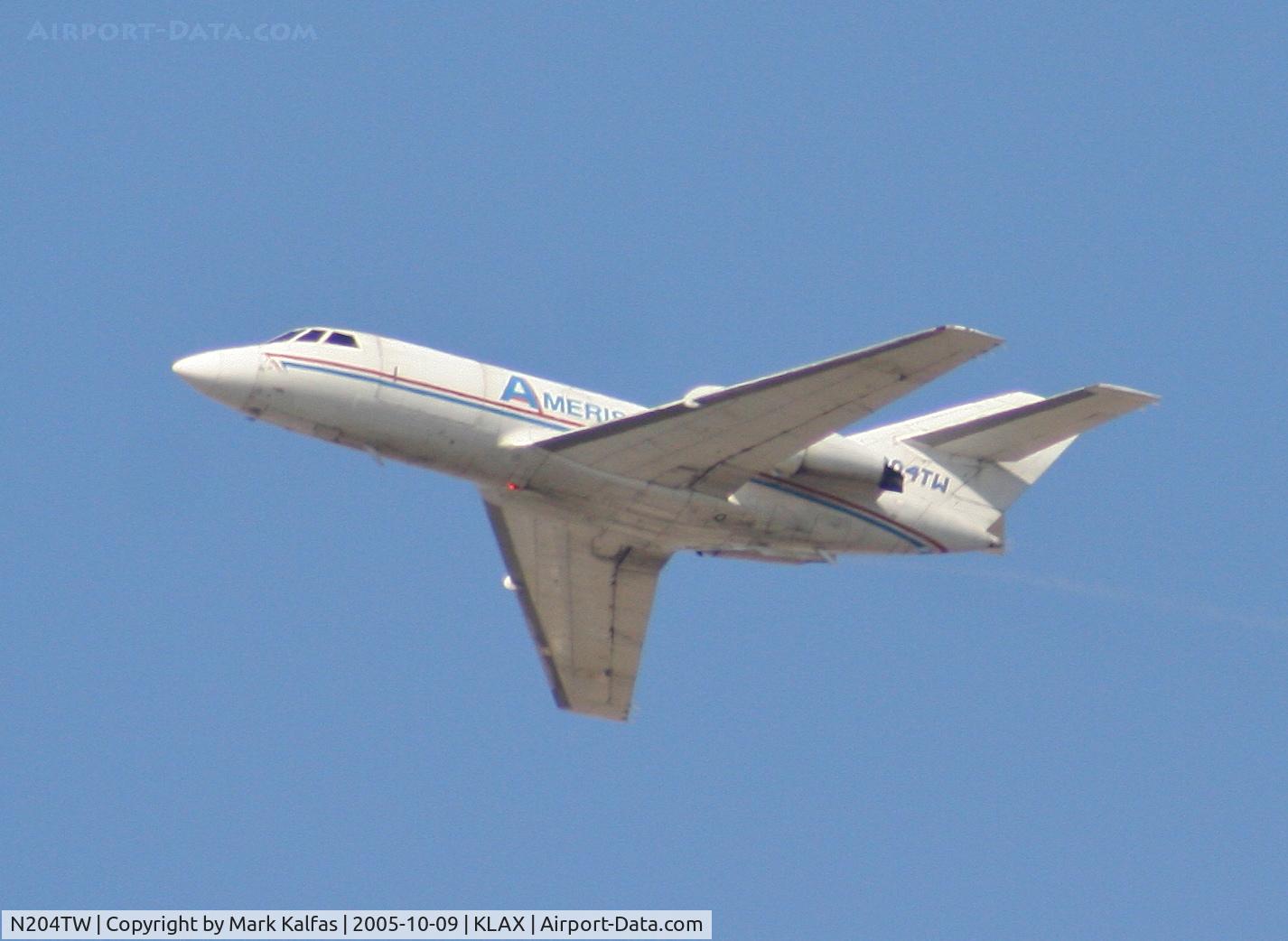 N204TW, 1969 Dassault Falcon (Mystere) 20D C/N 204, Ameristar Falcon 20DC, with a fuel leak on #2 departing 25L KLAX.