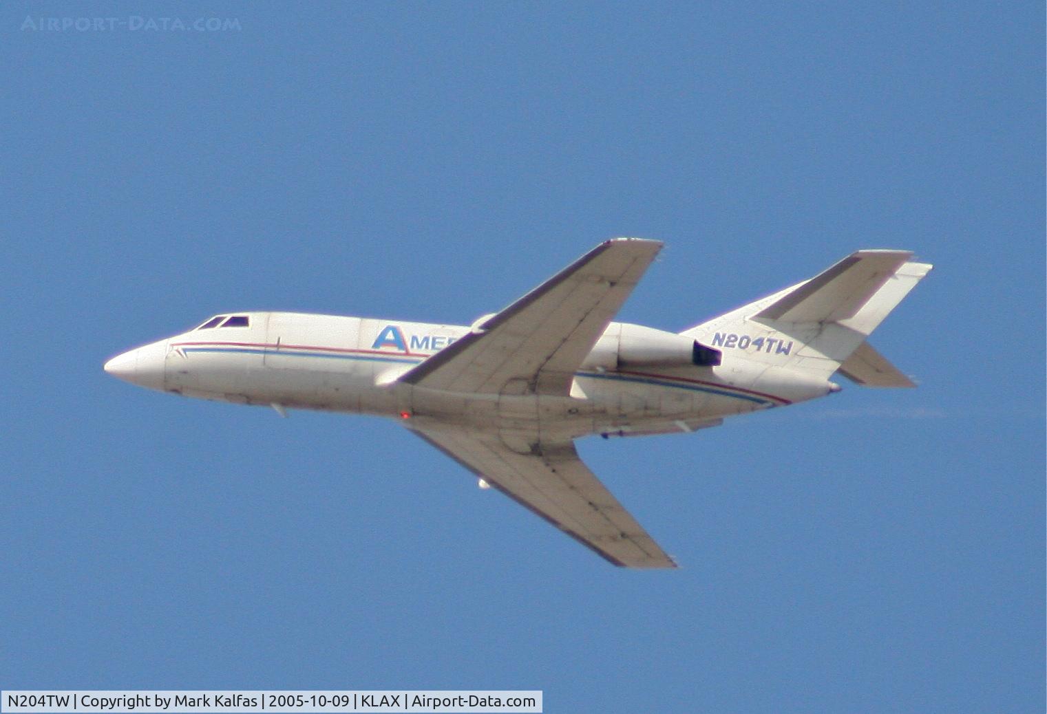 N204TW, 1969 Dassault Falcon (Mystere) 20D C/N 204, Ameristar Falcon 20DC, with a fuel leak on #2 departing 25L KLAX.