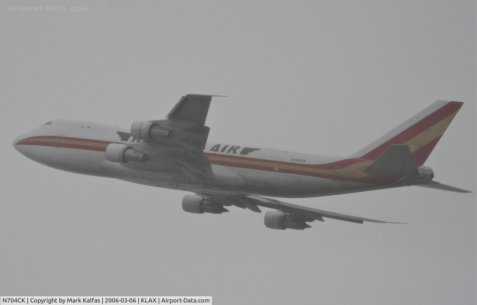 N704CK, 1980 Boeing 747-209F C/N 22299, Kalitta Air Boeing 747-209F, blasting through the fog, 25L departure KLAX.