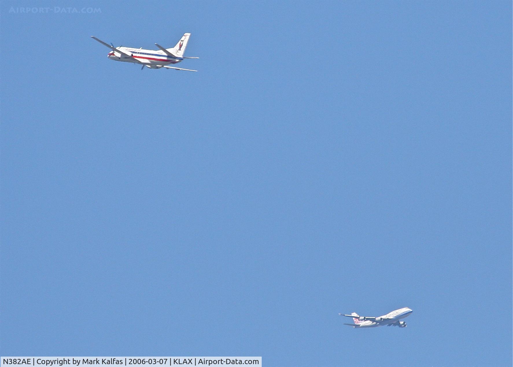 N382AE, Saab 340B C/N 340B-382, American Eagle SAAB 340B, 25R departure and Air China 744 downwind over SMO for the north complex KLAX.