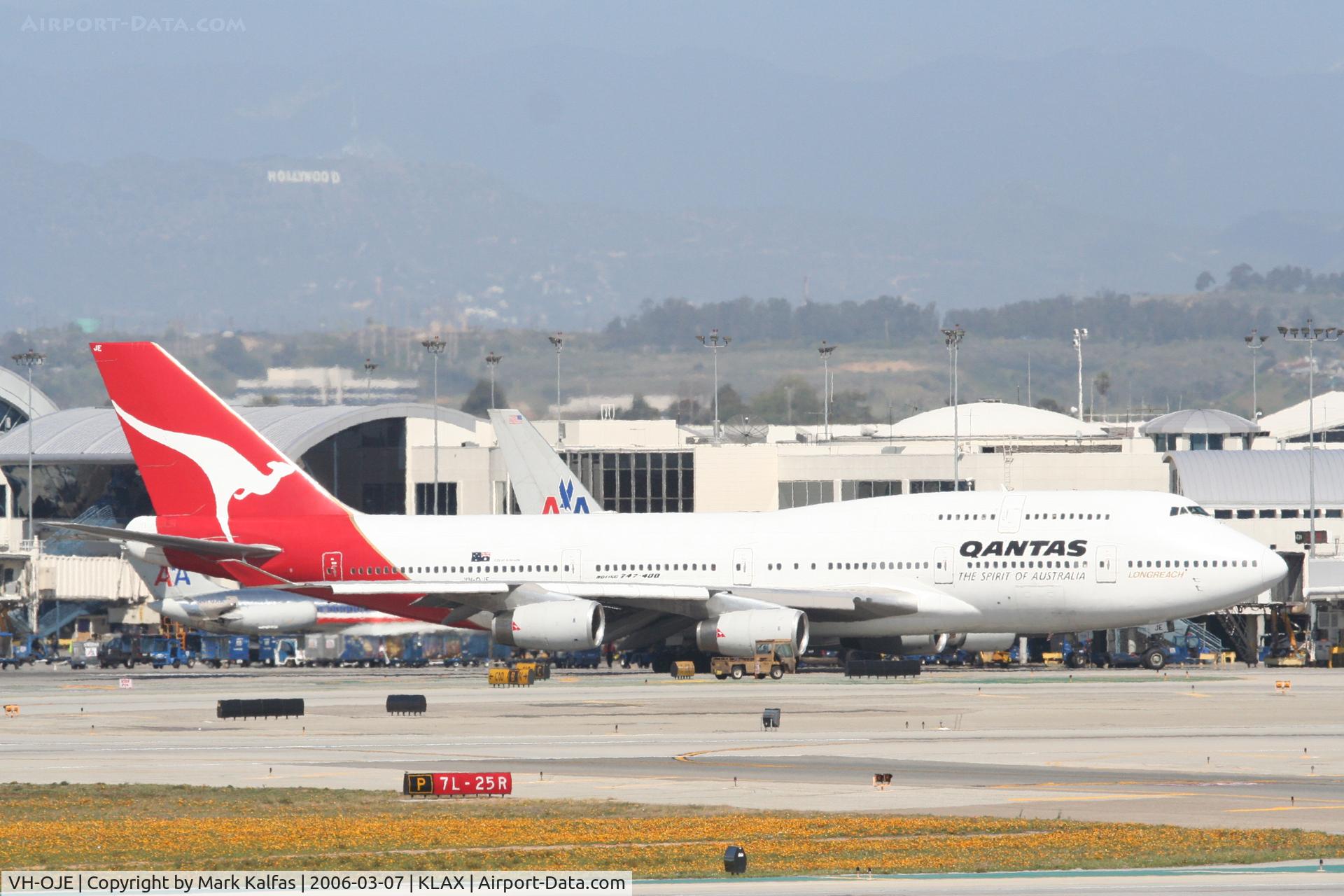 VH-OJE, 1989 Boeing 747-438 C/N 24482, Qantas Boeing 747-438, taxiing for a 25R departure KLAX.