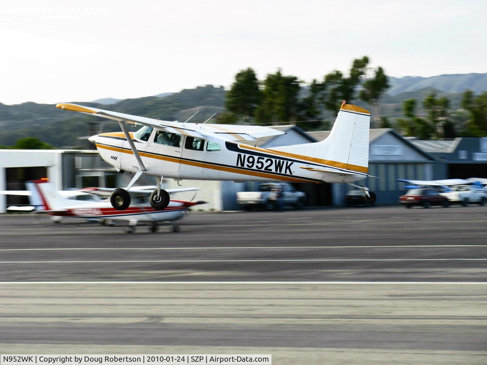 N952WK, 1980 Cessna A185F Skywagon 185 C/N 18504102, 1980 Cessna A185F SKYWAGON II, Continental IO-550-D 300 Hp Upgrade, takeoff climb Rwy 22
