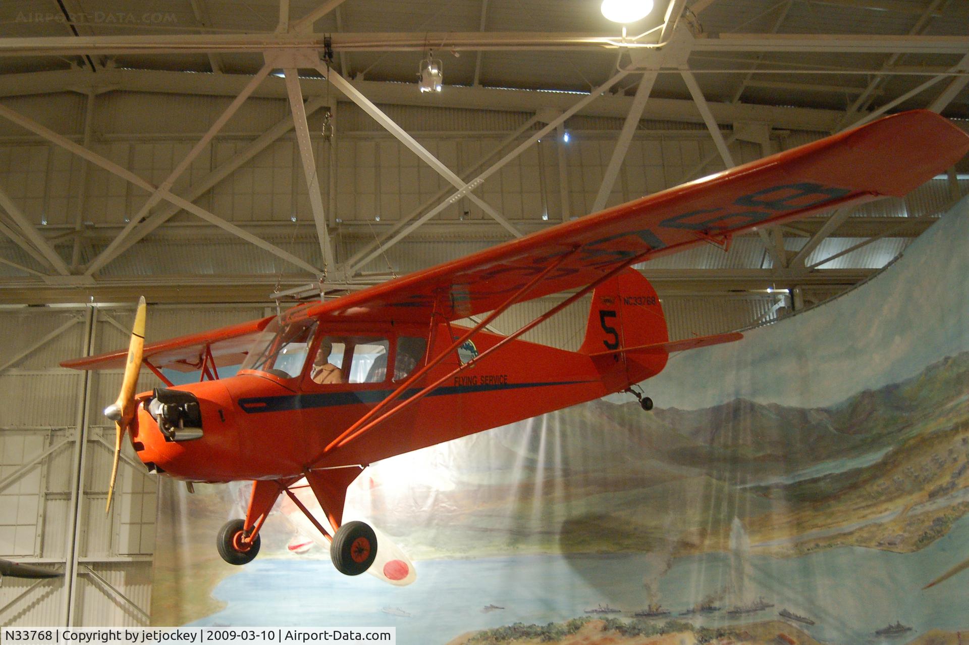 N33768, 1941 Aeronca 65-TC Tandem C/N 9391T,  Aeronca 65TC this was the first American aircraft fired at by the Japanese during the raid on Pearl Harbour (it was being flown by a father for the benefit of giving his young son a flight) and hangs in Hanger 37 at the Pacific  Aviation Museum in Hawaii