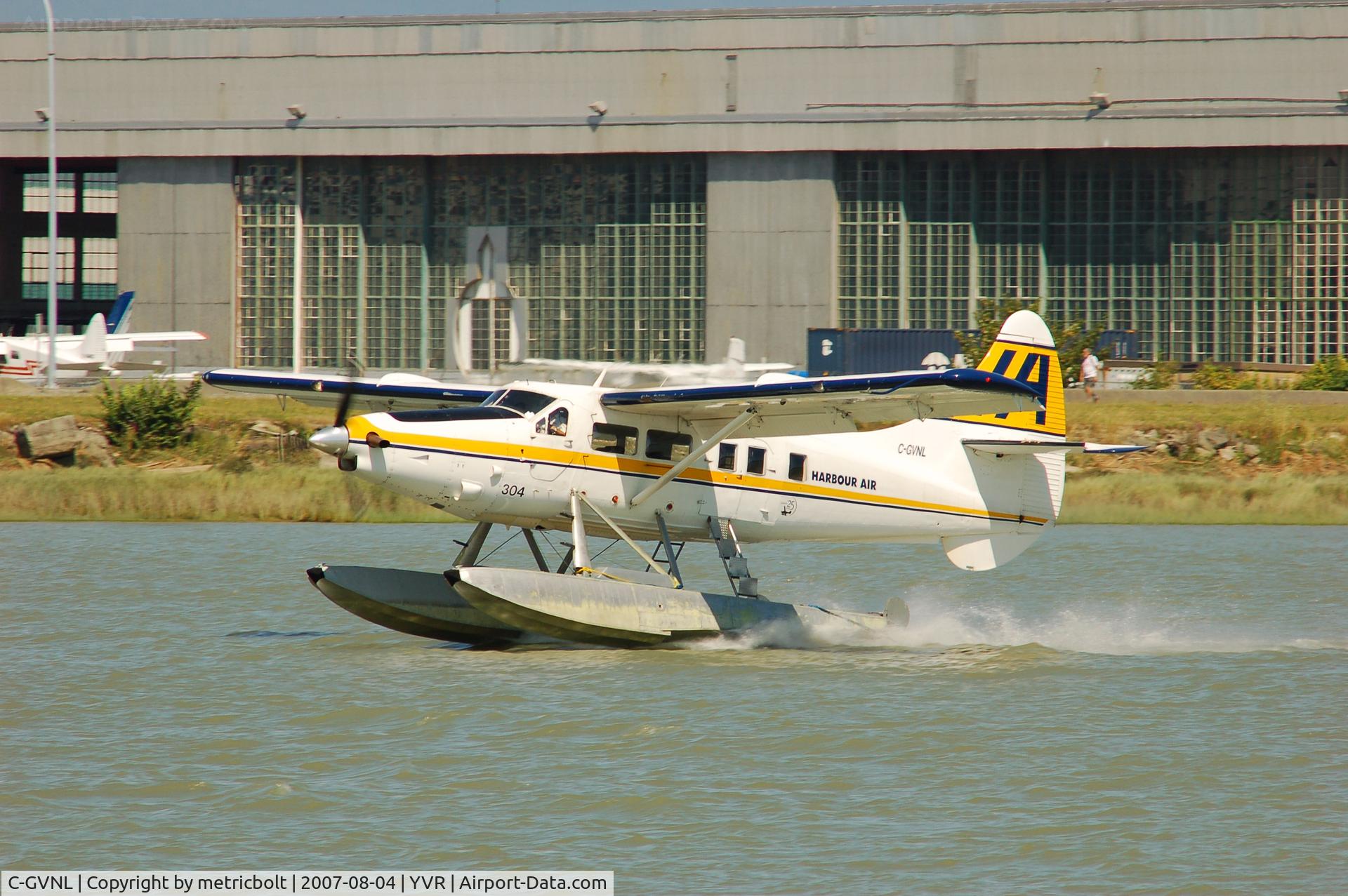 C-GVNL, 1956 De Havilland Canada DHC-3 Otter C/N 105, landing on the Fraser River