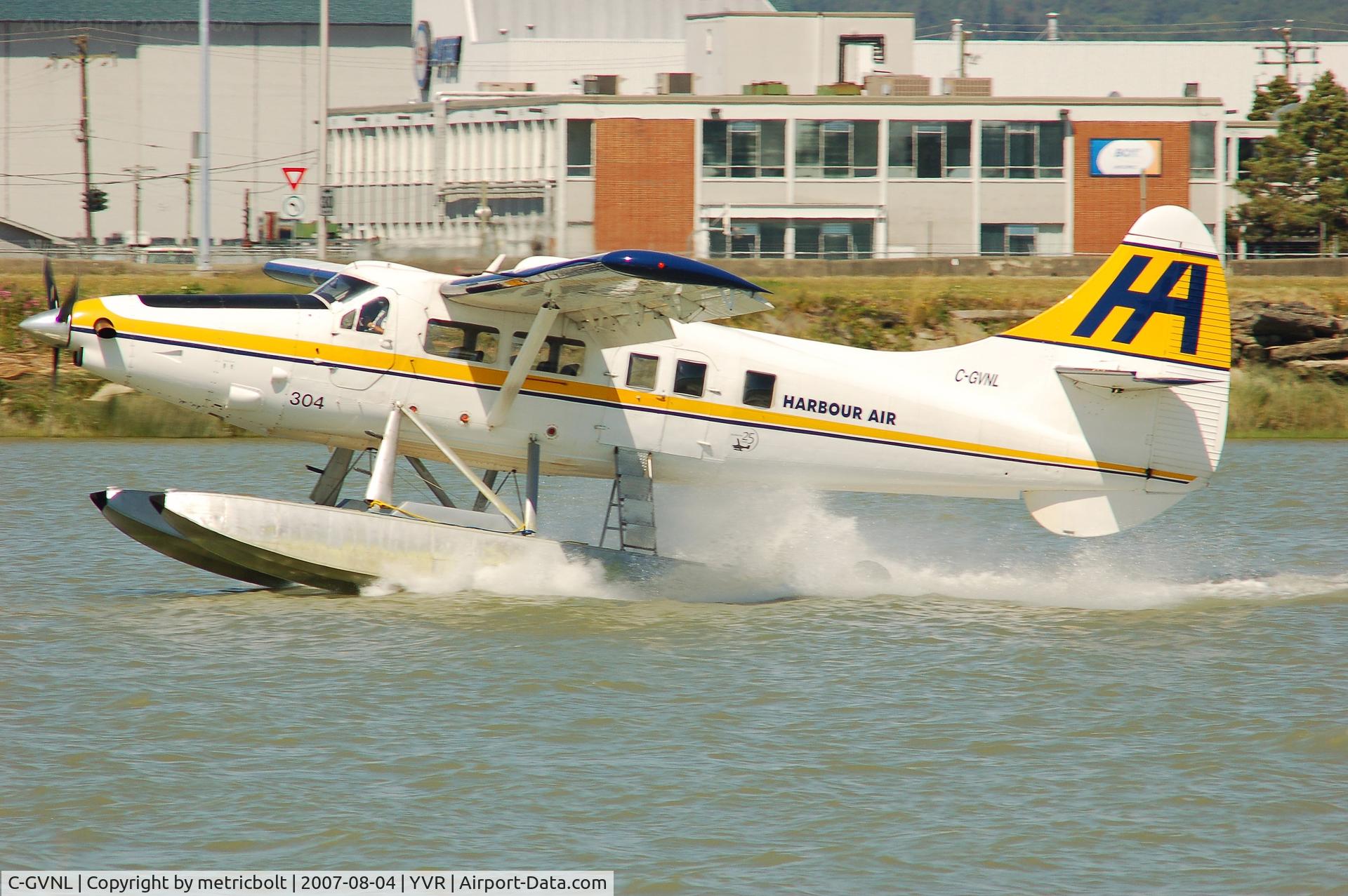 C-GVNL, 1956 De Havilland Canada DHC-3 Otter C/N 105, landing on the Fraser River