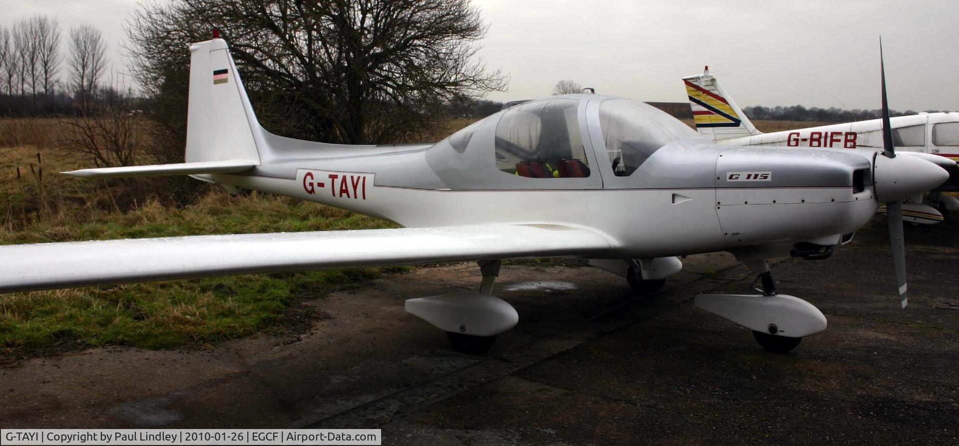 G-TAYI, 1987 Grob G-115A C/N 8008, Chained down !