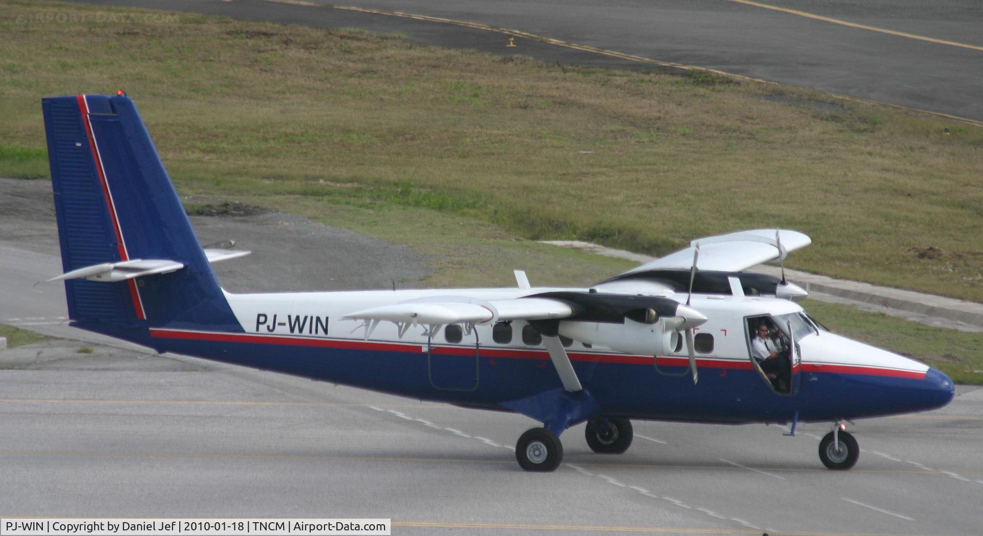 PJ-WIN, 1976 De Havilland Canada DHC-6-300 Twin Otter C/N 518, PJ-WIN taxing on the bypass for alpha and it looks like the co pilot looks like he has nothing to do!!!!!