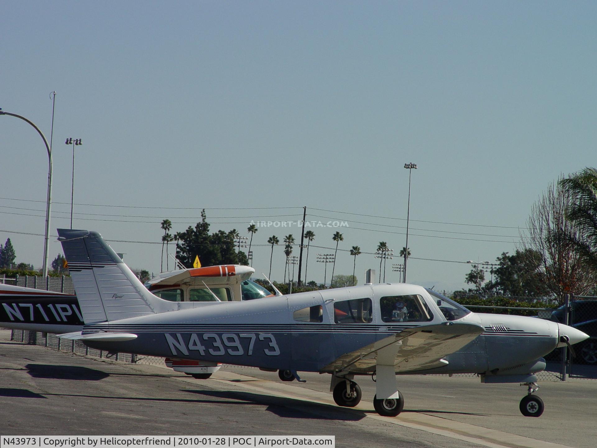 N43973, 1977 Piper PA-28R-201T Cherokee Arrow III C/N 28R-7703322, Parked at Howard Aviation