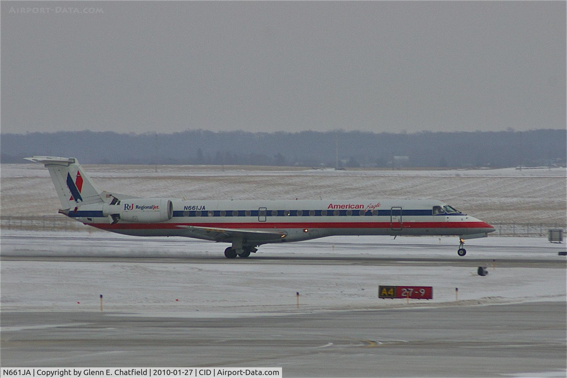 N661JA, 2003 Embraer ERJ-145LR (EMB-145LR) C/N 145766, Landing runway 27 during light snow