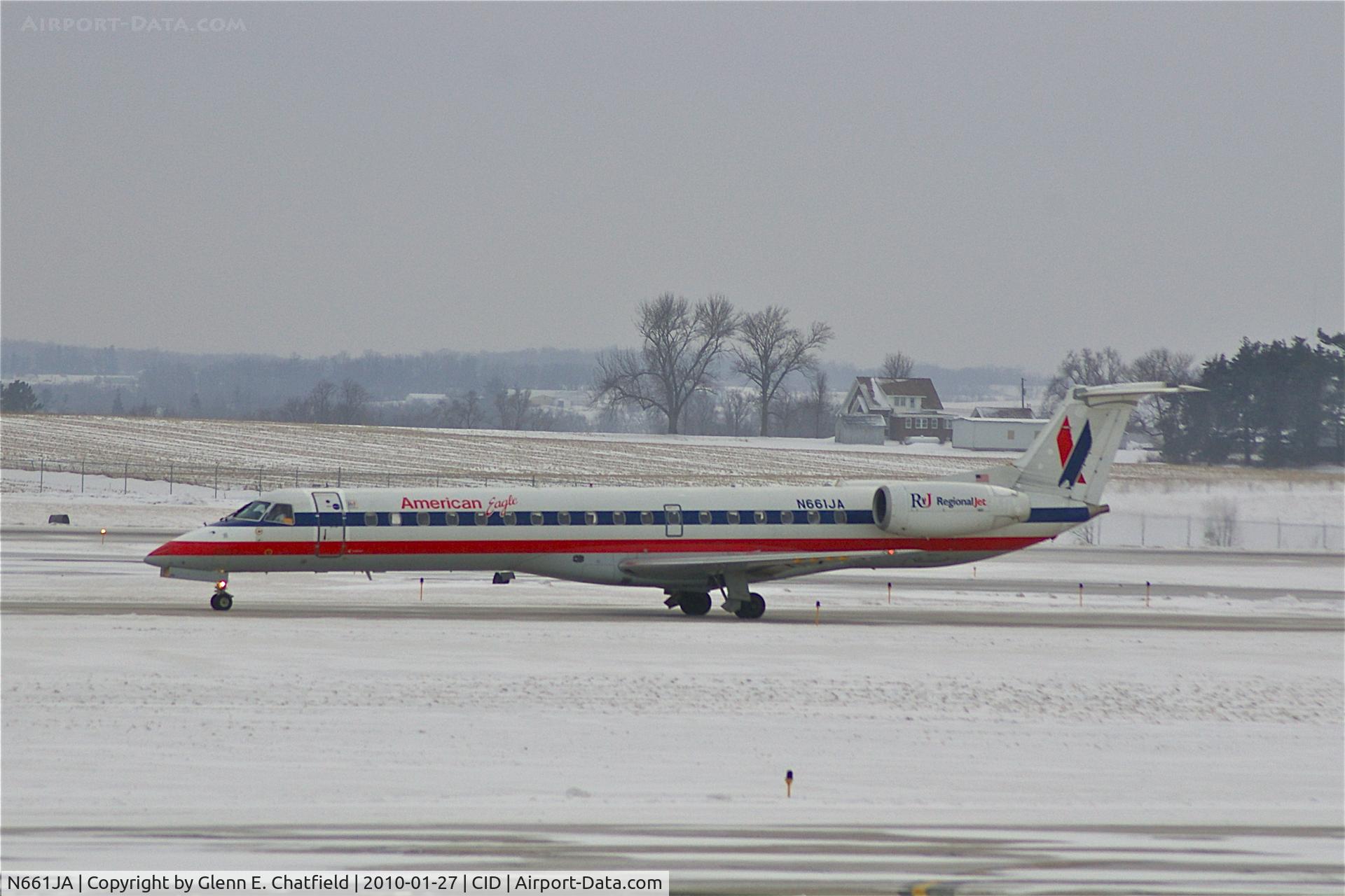 N661JA, 2003 Embraer ERJ-145LR (EMB-145LR) C/N 145766, Landing runway 27 during light snow