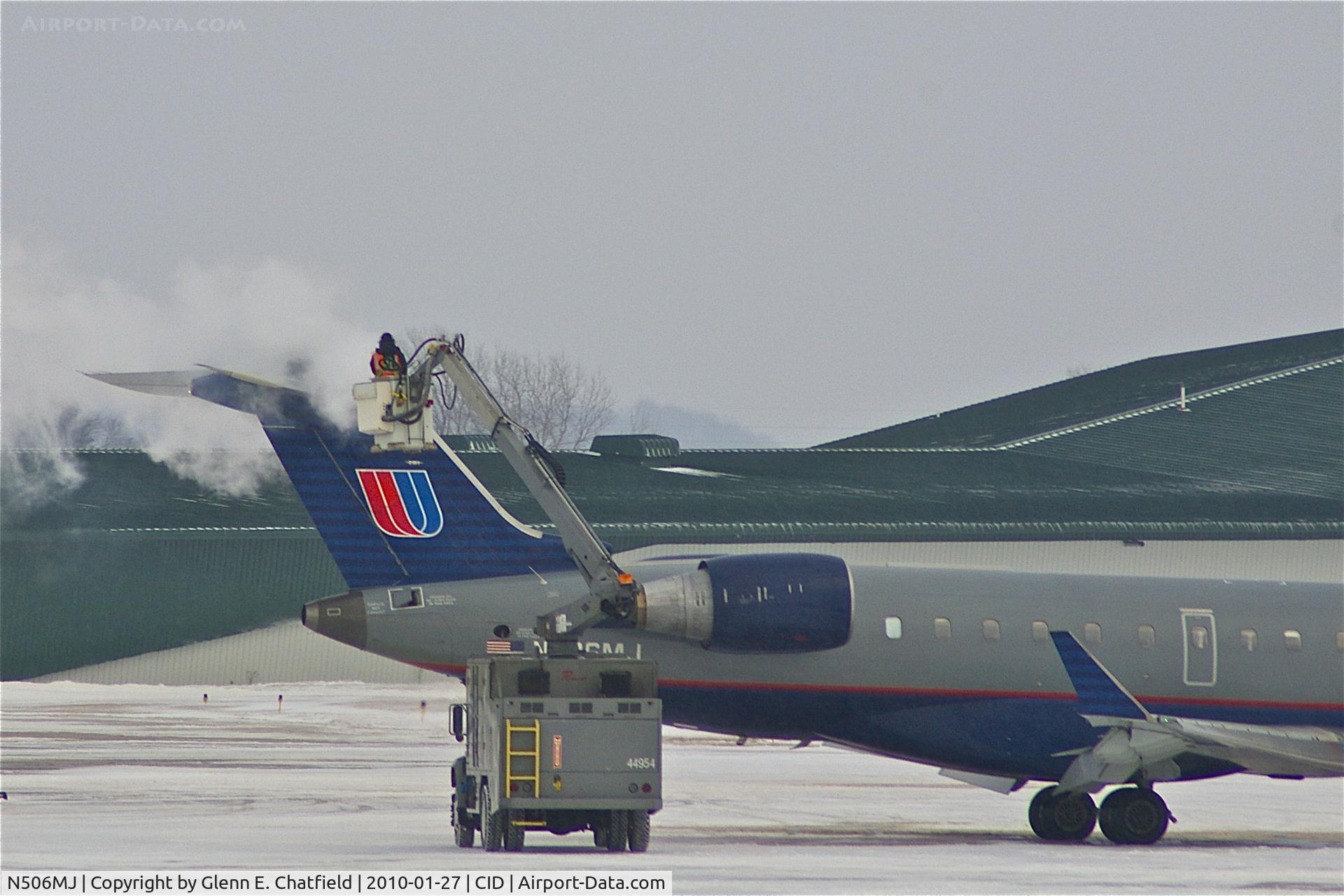 N506MJ, 2002 Bombardier RJ-700 (CL-600-2C10) Regional Jet C/N 10073, De-icing during light snow