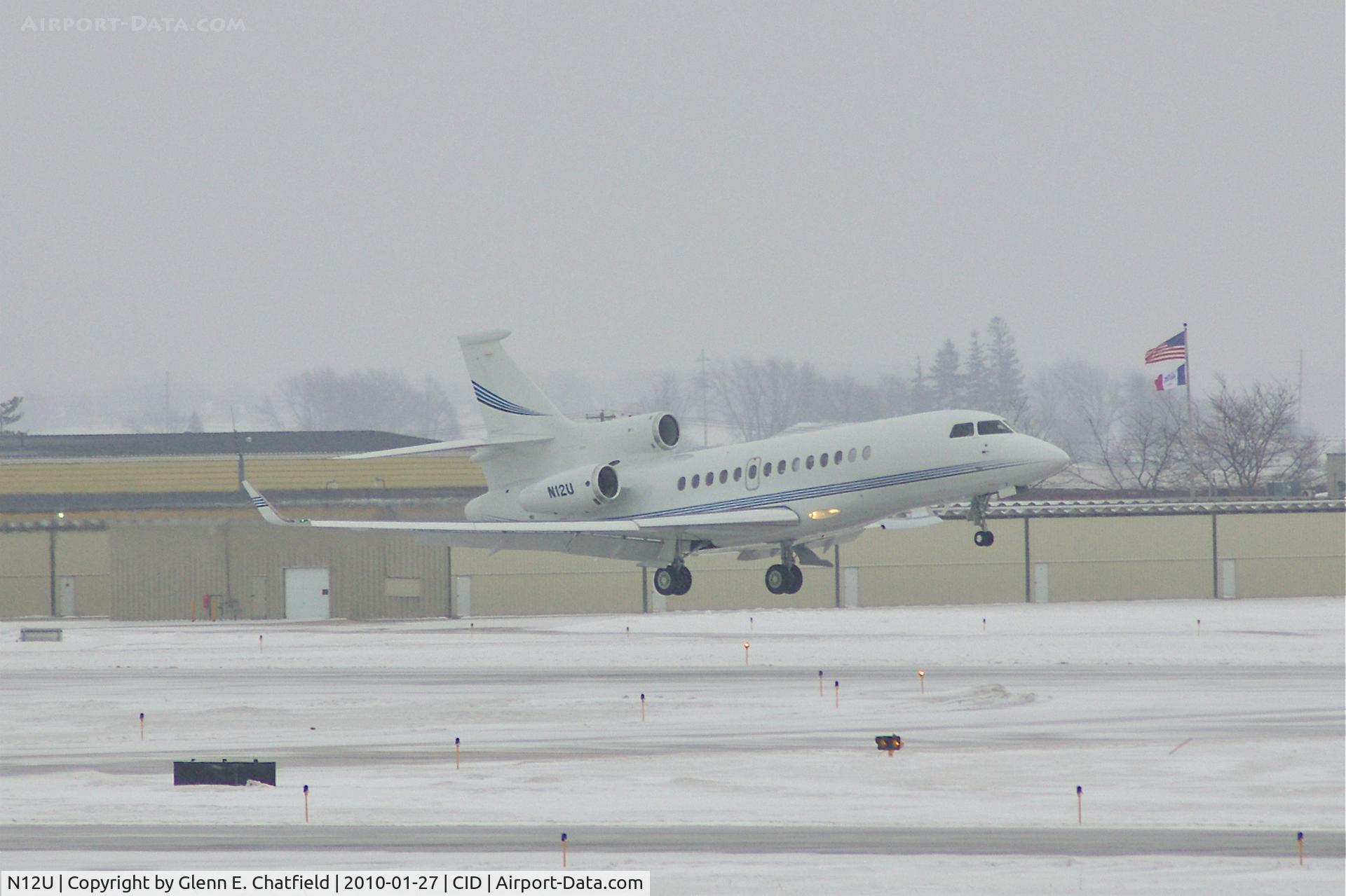 N12U, 2008 Dassault Falcon 7X C/N 53, In the flare over the numbers on Runway 27 during snow shower