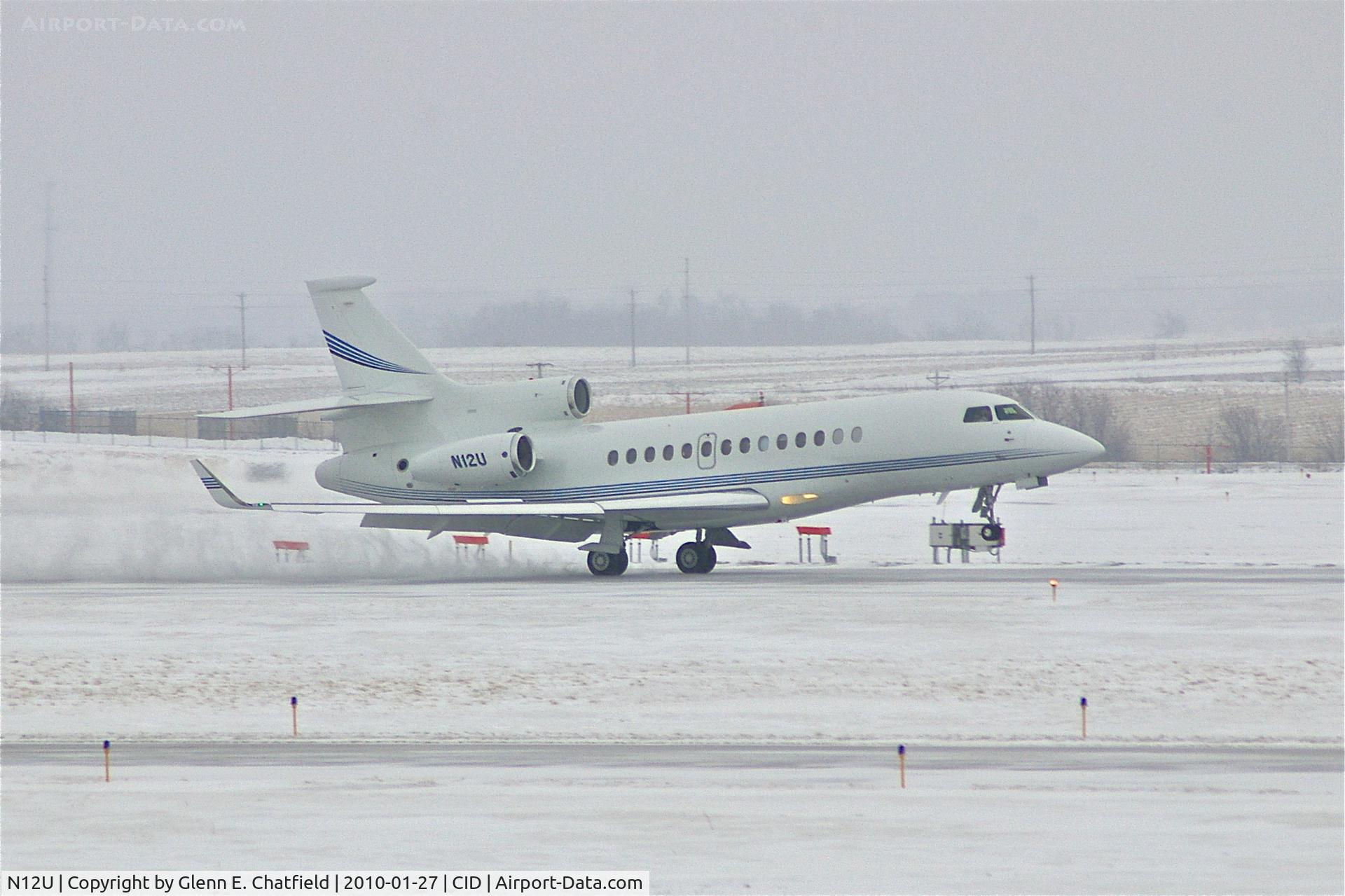 N12U, 2008 Dassault Falcon 7X C/N 53, Touching down on Runway 27 during snow shower